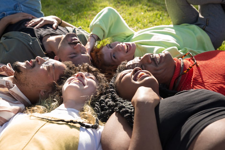 Diverse group of women smiling and relaxing after a yoga session